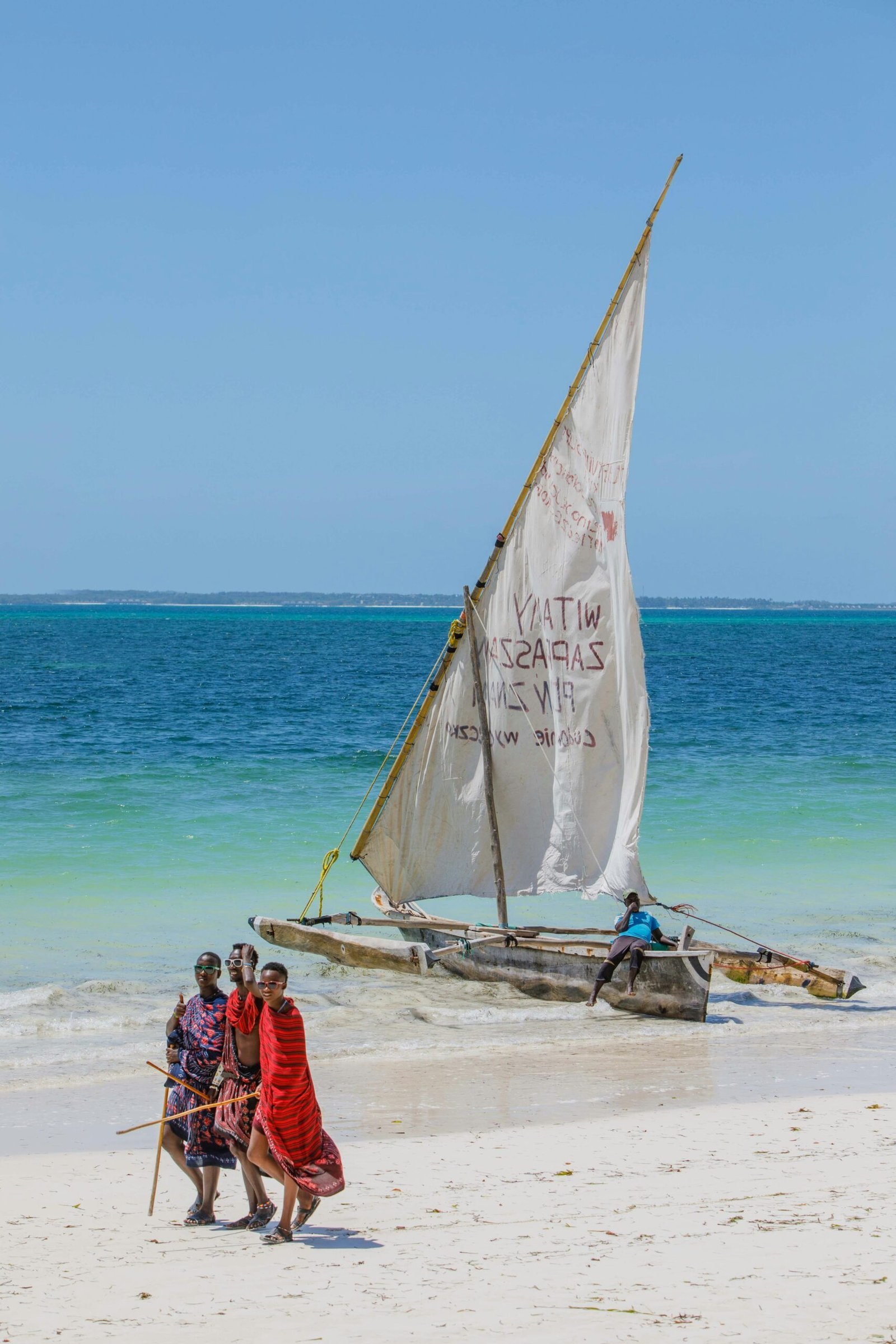 Travellers enjoying a Zanzibar beach holiday